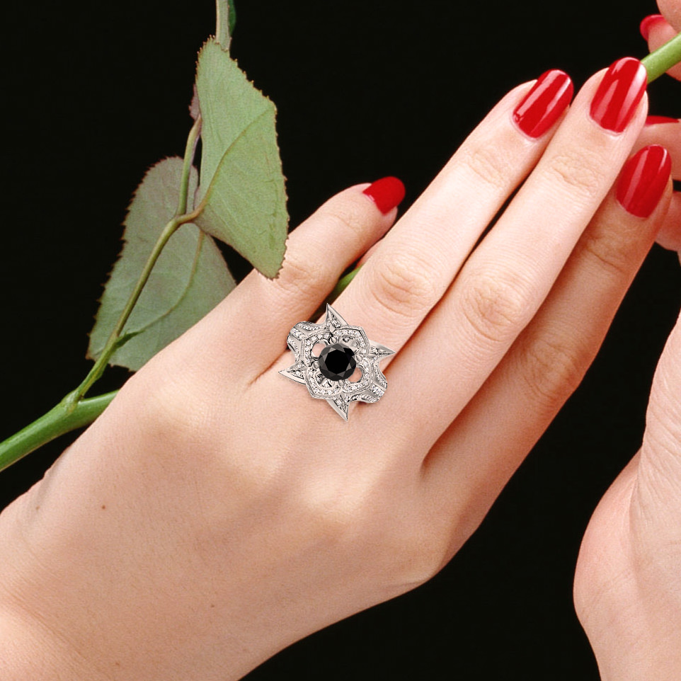 https://www.goldiam.easystockhosting.com/sites/default/files/D44677-1_ringfinger2_whitegold_blackdiamond.jpg